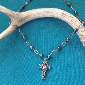 Black pearl and silver cross necklace